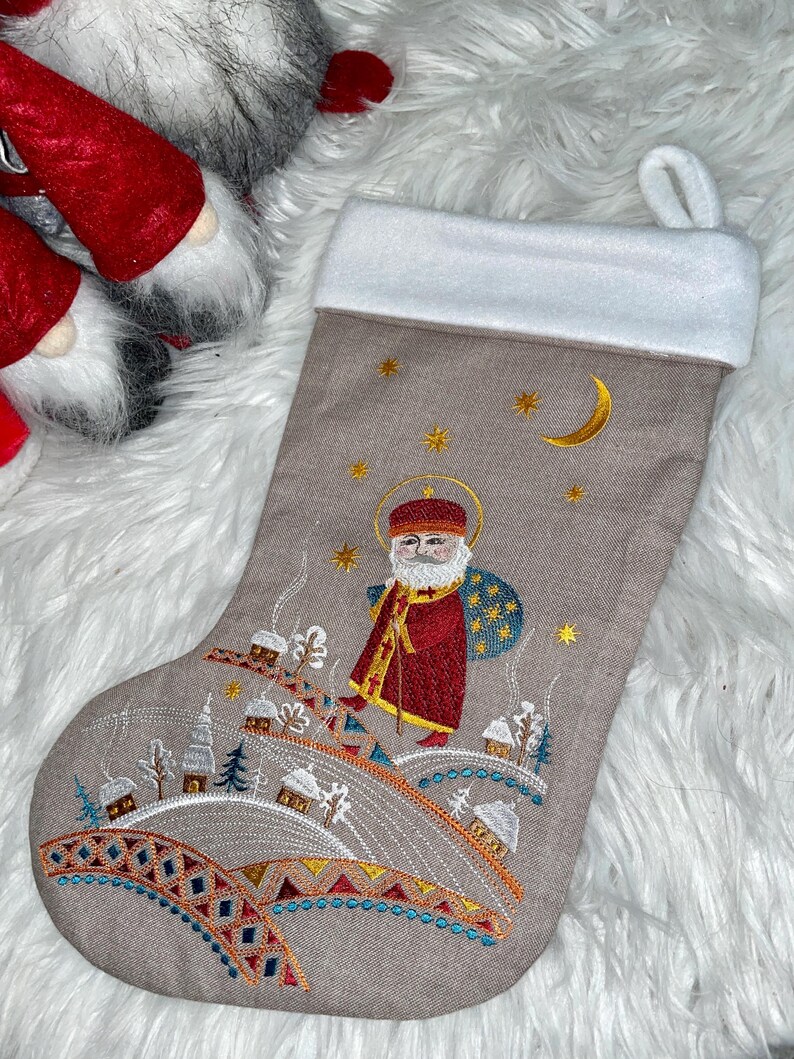 Embroidered Christmas stocking with folk nativity design, Fabric holiday stocking with traditional pattern, Festive home decor