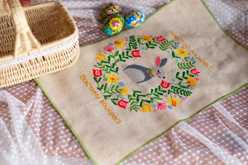 Handmade embroidered Easter basket cover with bunny and floral wreath design