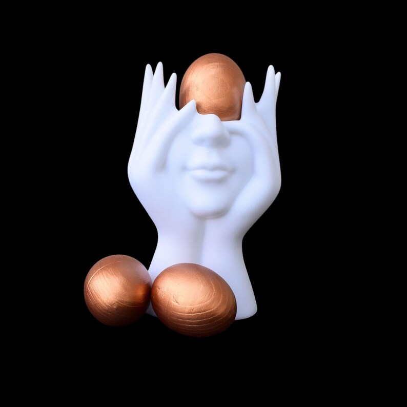 Elegant wooden decorative eggs in gift box for spring holiday table or Christian decor
