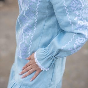 Light blue linen dress with white embroidery