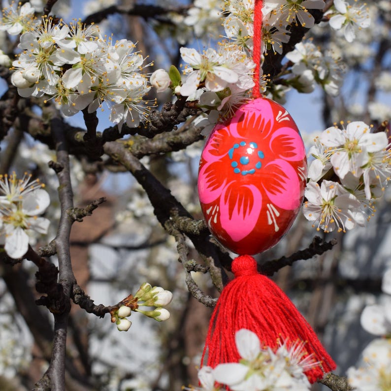 Vibrant wooden Easter egg ornaments with tassels