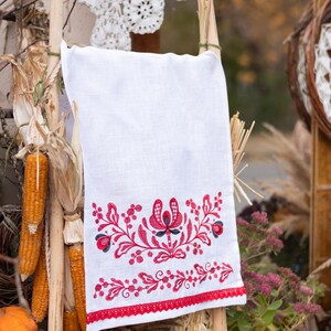 Red embroidered linen bread towel