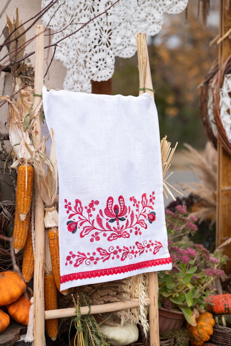 Red embroidered linen bread towel