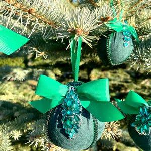 Set of green handmade Christmas tree decorations