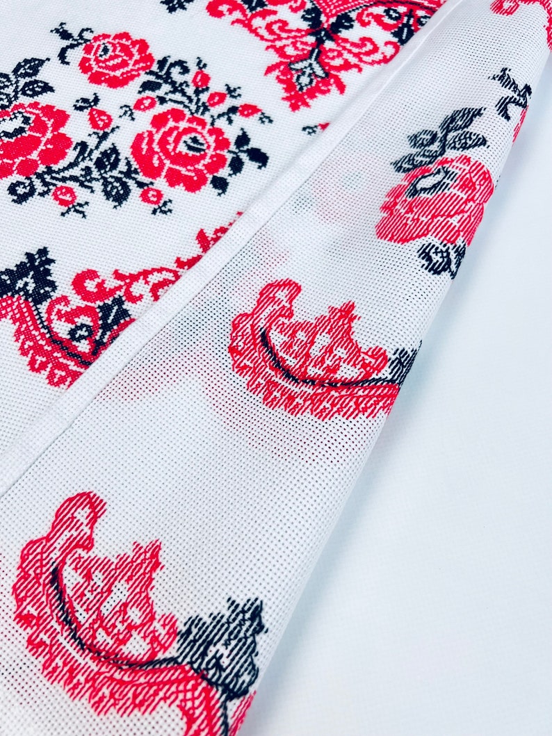 Handmade embroidered towel with red rose motifs and lace trim