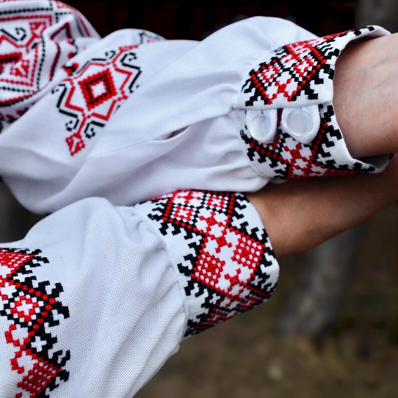 White Folk Embroidered Blouse with Red and Black Geometric Patterns – Long Sleeve Traditional Peasant Shirt for Women with Tassel Tie Detail
