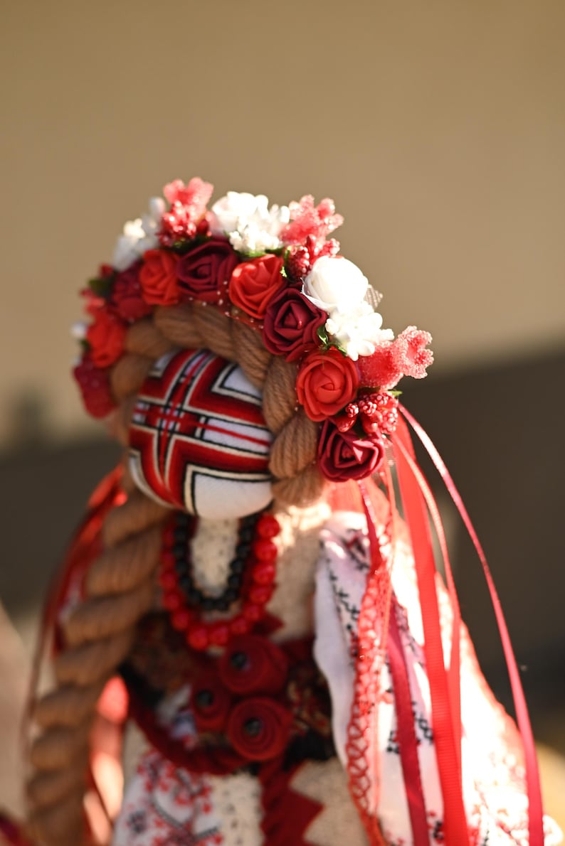 Handmade Ukrainian Motanka doll with embroidered face and traditional wreath, Collectible doll art, Unique decorative gift image 5