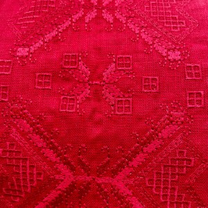 Red linen sleeveless blouse with traditional Ukrainian stitch embroidery