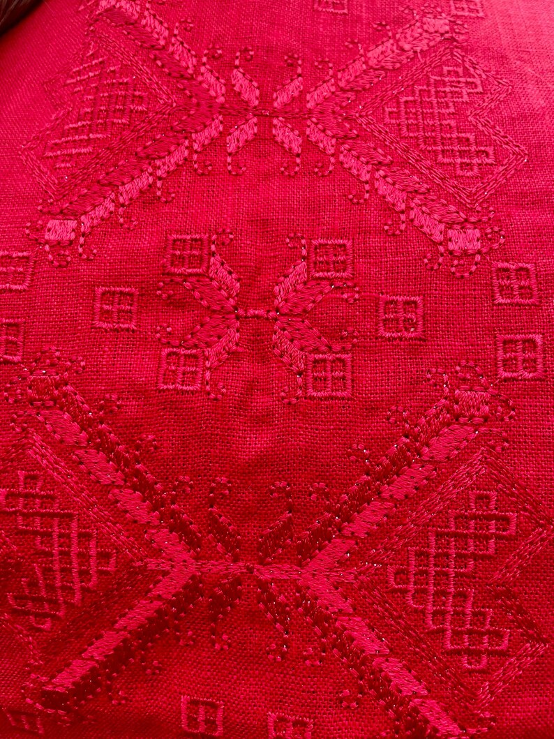 Red linen sleeveless blouse with traditional Ukrainian stitch embroidery