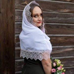 White mantilla scarf with delicate pink lace trim