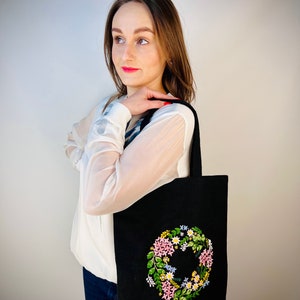 Handmade black tote bag with floral embroidery