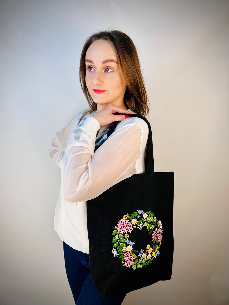 Handmade black tote bag with floral embroidery