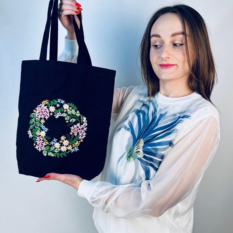 Handmade black tote bag with floral embroidery