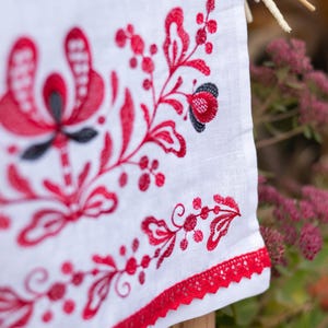 Red embroidered linen bread towel