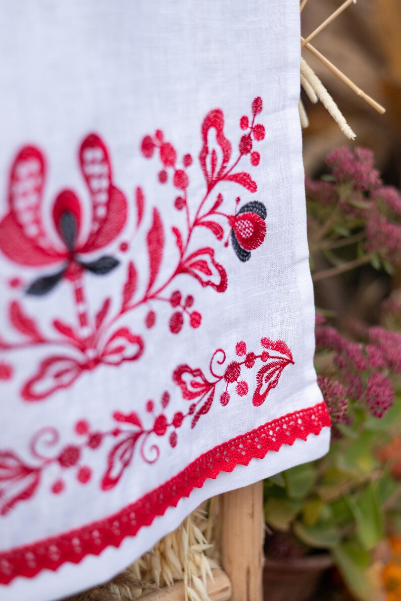 Red embroidered linen bread towel