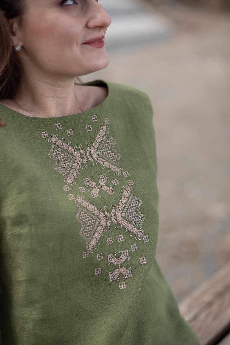 Green linen sleeveless top with embroidery