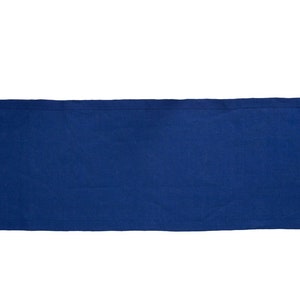 Elegant blue linen table runner for dining table