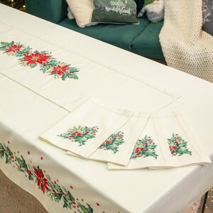 Beige Christmas centrepiece with Embroidered Holiday Wreath and Poinsettias, Elegant Festive Dining Set with Napkins, Winter Pinecone Decor.