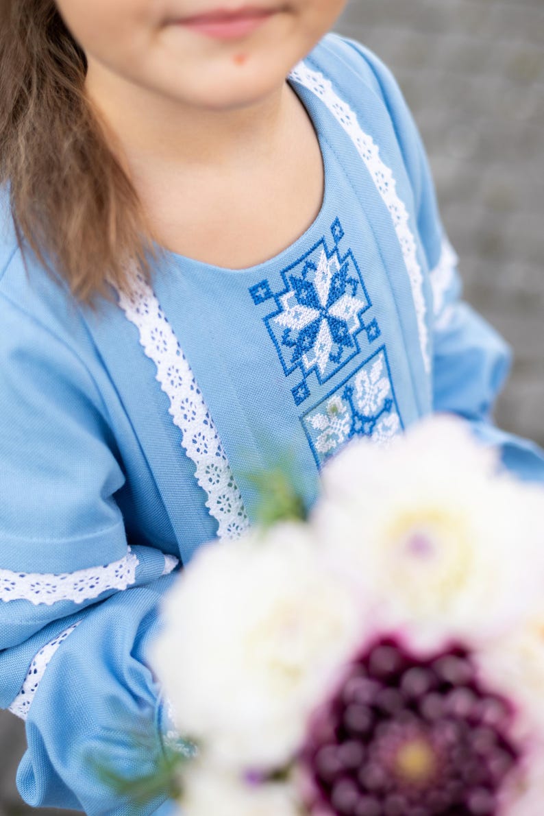 Traditional blue embroidered Ukrainian girl dress with long sleeves and white lace trim, Folk style cotton outfit for special occasions