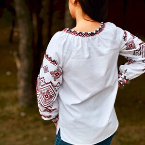 White Folk Embroidered Blouse with Red and Black Geometric Patterns – Long Sleeve Traditional Peasant Shirt for Women with Tassel Tie Detail