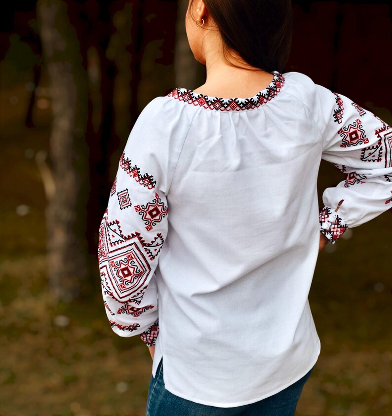 White Folk Embroidered Blouse with Red and Black Geometric Patterns – Long Sleeve Traditional Peasant Shirt for Women with Tassel Tie Detail