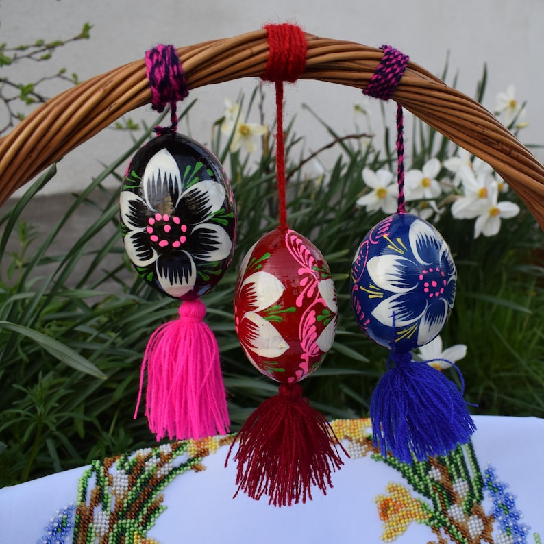 Vibrant wooden Easter egg ornaments with tassels
