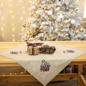 Festive beige cotton centerpiece cover with holiday winter scenes