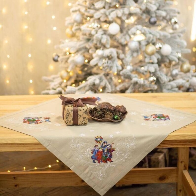 Festive beige cotton centerpiece cover with holiday winter scenes