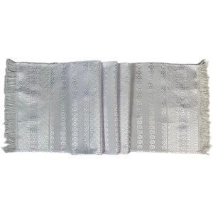 Runner with intricate woven pattern
