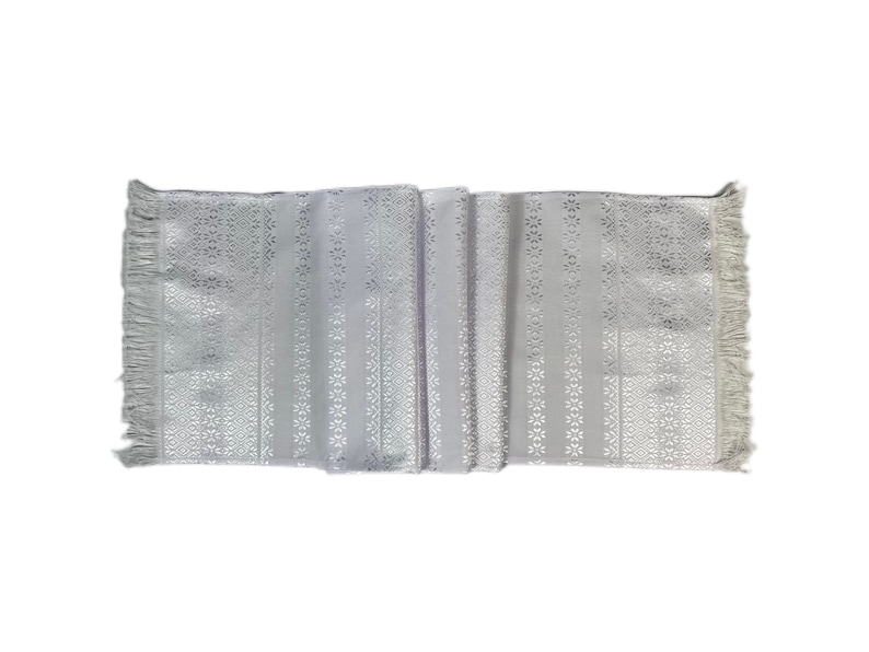 Runner with intricate woven pattern