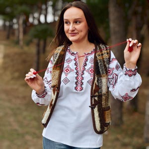 White Folk Embroidered Blouse with Red and Black Geometric Patterns – Long Sleeve Traditional Peasant Shirt for Women with Tassel Tie Detail