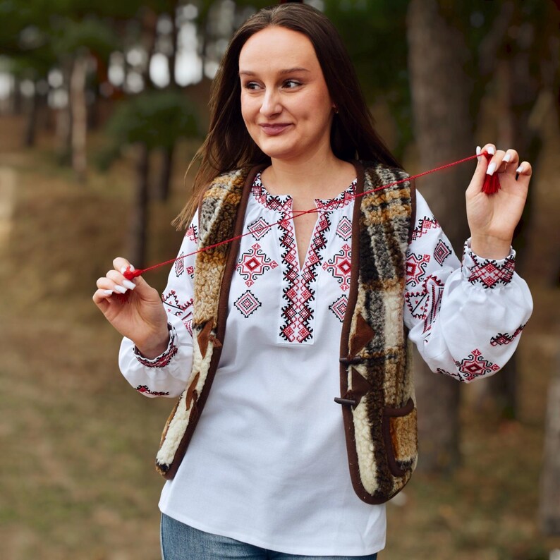 White Folk Embroidered Blouse with Red and Black Geometric Patterns – Long Sleeve Traditional Peasant Shirt for Women with Tassel Tie Detail