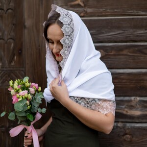 White mantilla scarf with delicate pink lace trim