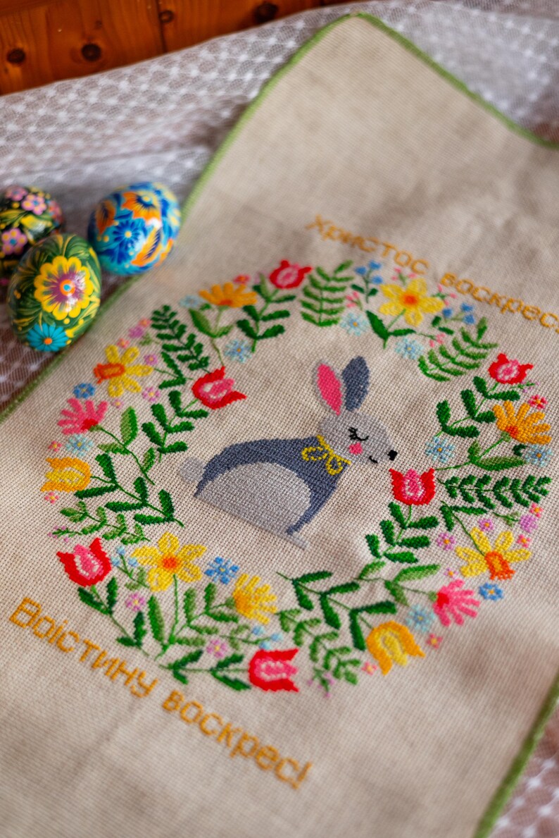 Handmade embroidered Easter basket cover with bunny and floral wreath design