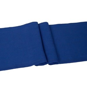 Elegant blue linen table runner for dining table
