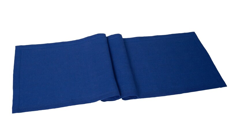 Elegant blue linen table runner for dining table