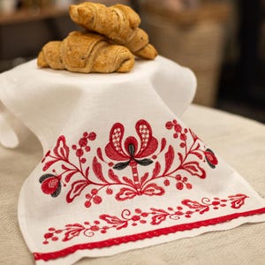 Red embroidered linen bread towel
