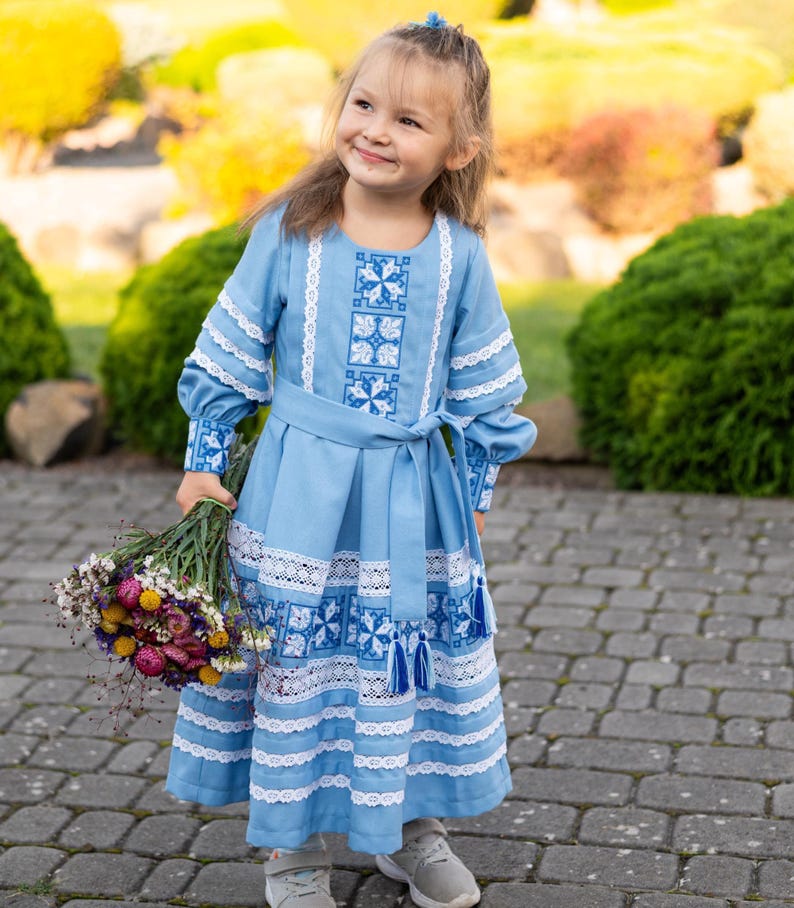Traditional blue embroidered Ukrainian girl dress with long sleeves and white lace trim, Folk style cotton outfit for special occasions