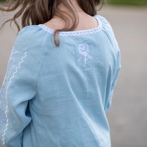 Light blue linen dress with white embroidery