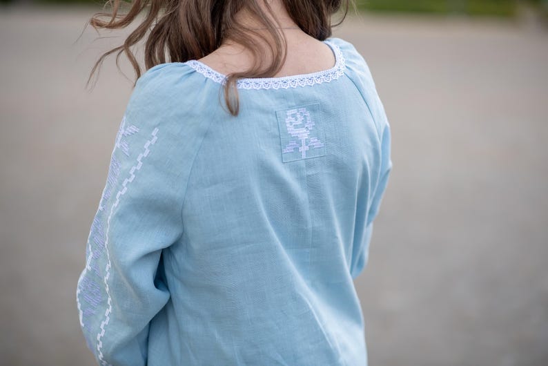 Light blue linen dress with white embroidery