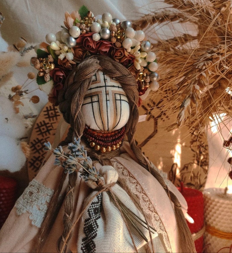 Handmade Ukrainian Motanka doll with floral headpiece