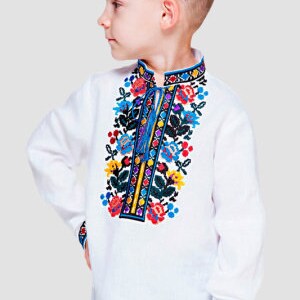 May include: A white linen shirt with colorful embroidered flowers and a blue trim. The shirt has a stand-up collar and long sleeves.