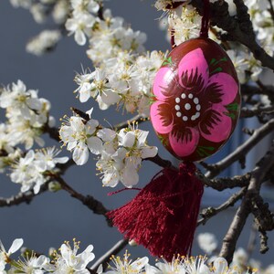Vibrant wooden Easter egg ornaments with tassels