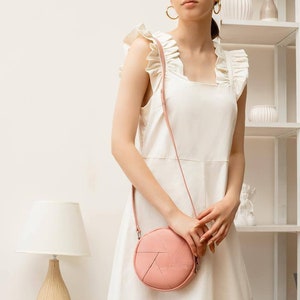 Round Pink Crossbody Bag Minimalist Circle Purse with Adjustable Strap, Modern Small Shoulder Bag for Everyday Wear and Casual Outfits