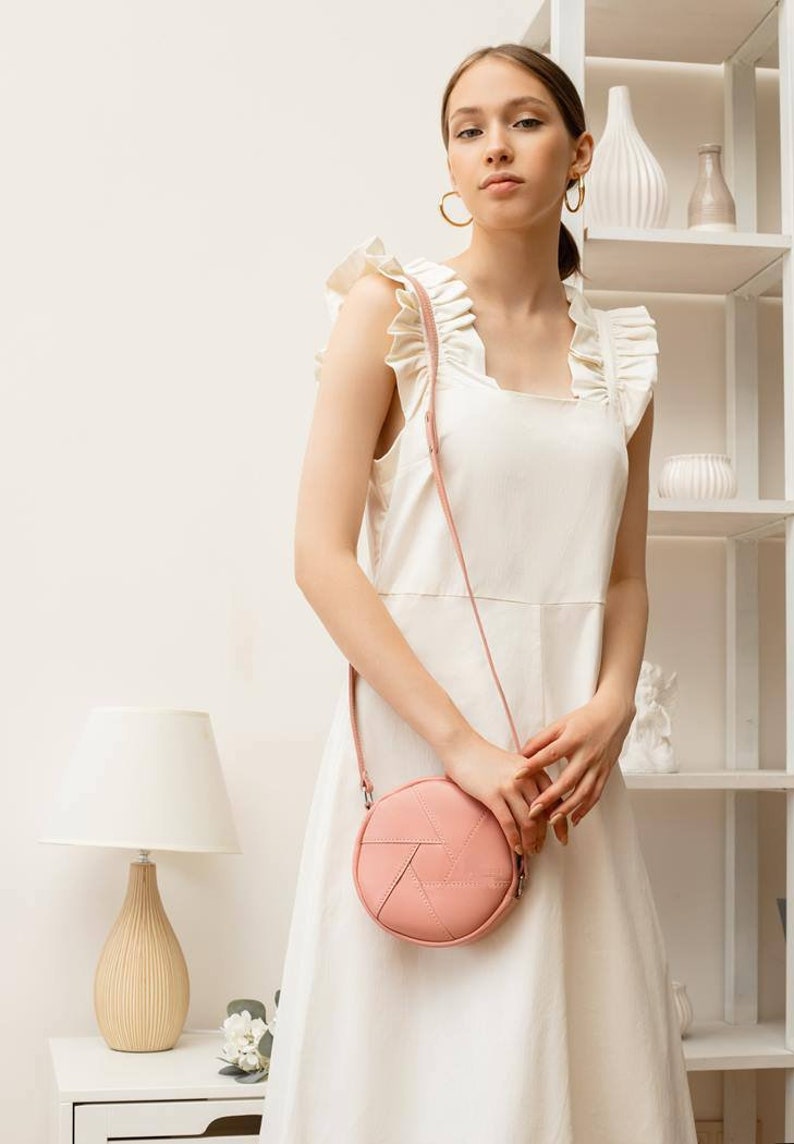 Round Pink Crossbody Bag Minimalist Circle Purse with Adjustable Strap, Modern Small Shoulder Bag for Everyday Wear and Casual Outfits