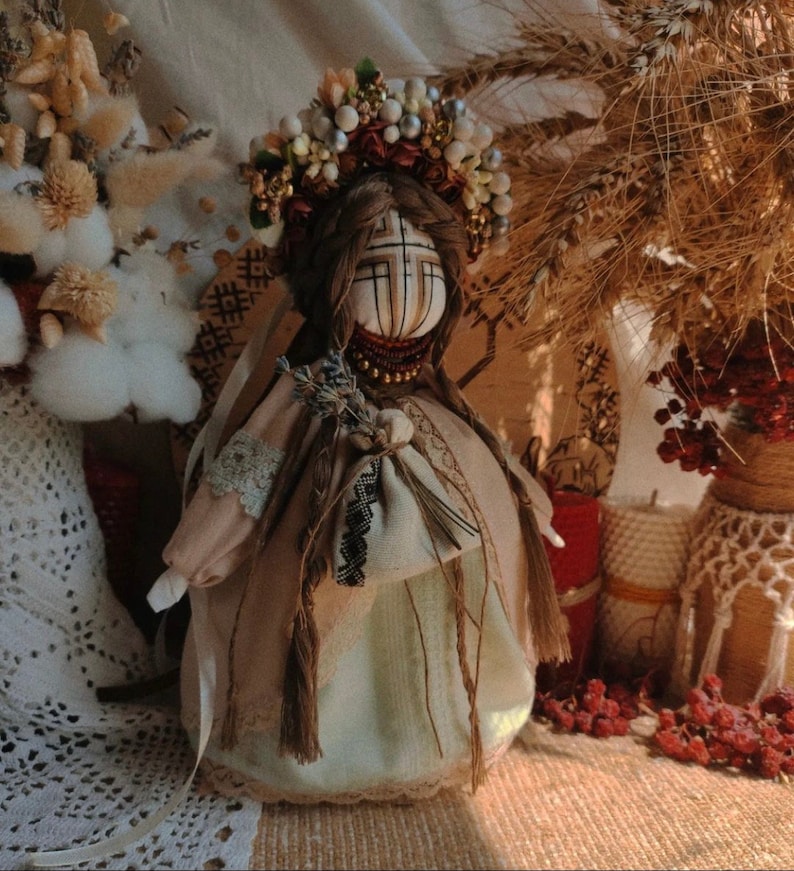 Handmade Ukrainian Motanka doll with floral headpiece