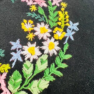 Handmade black tote bag with floral embroidery