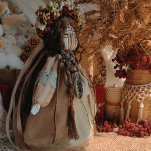 Handmade Ukrainian Motanka doll with floral headpiece