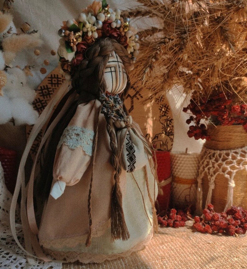 Handmade Ukrainian Motanka doll with floral headpiece