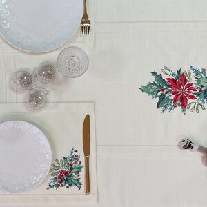 Beige Christmas centrepiece with Embroidered Holiday Wreath and Poinsettias, Elegant Festive Dining Set with Napkins, Winter Pinecone Decor.
